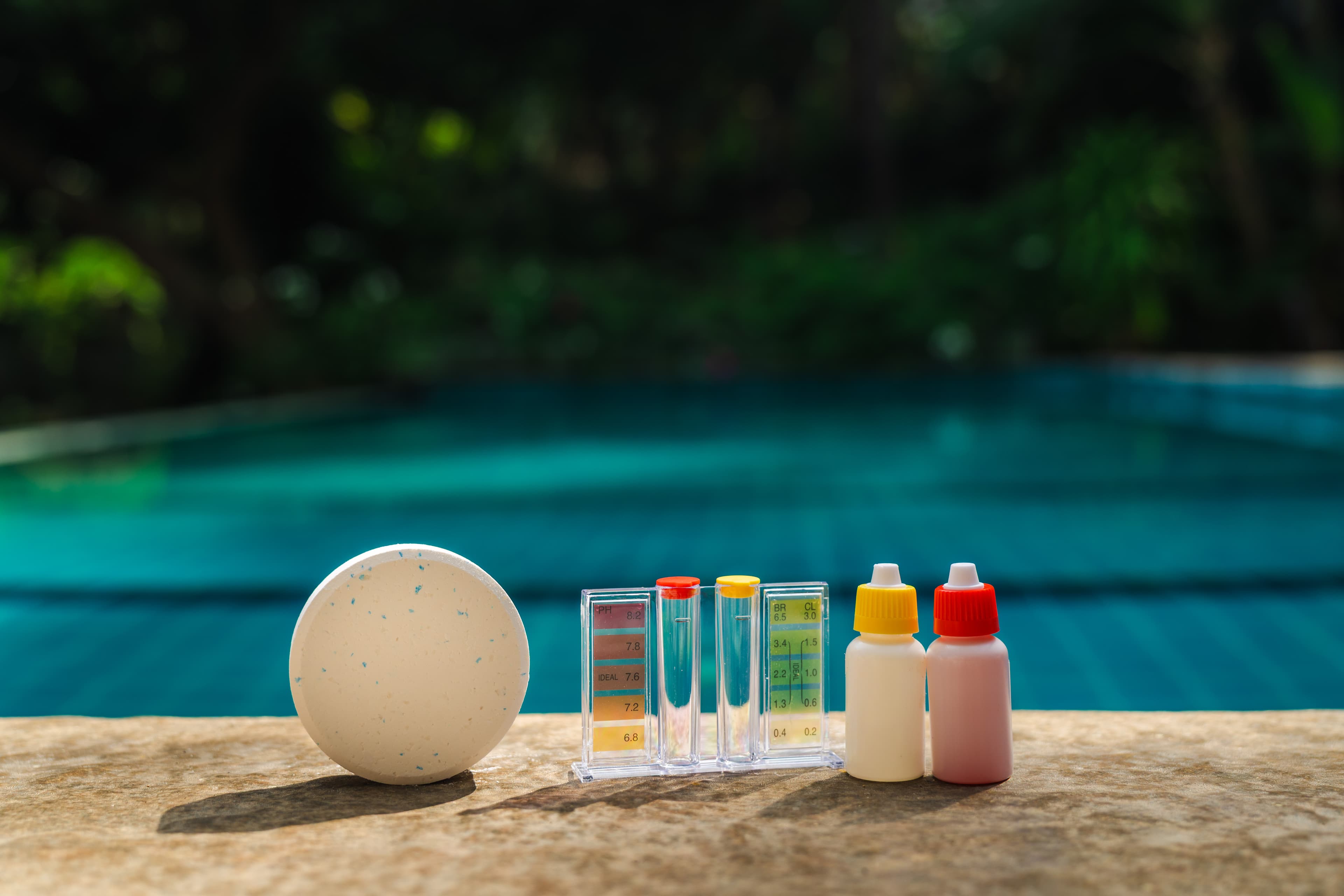 Water testing kit at poolside