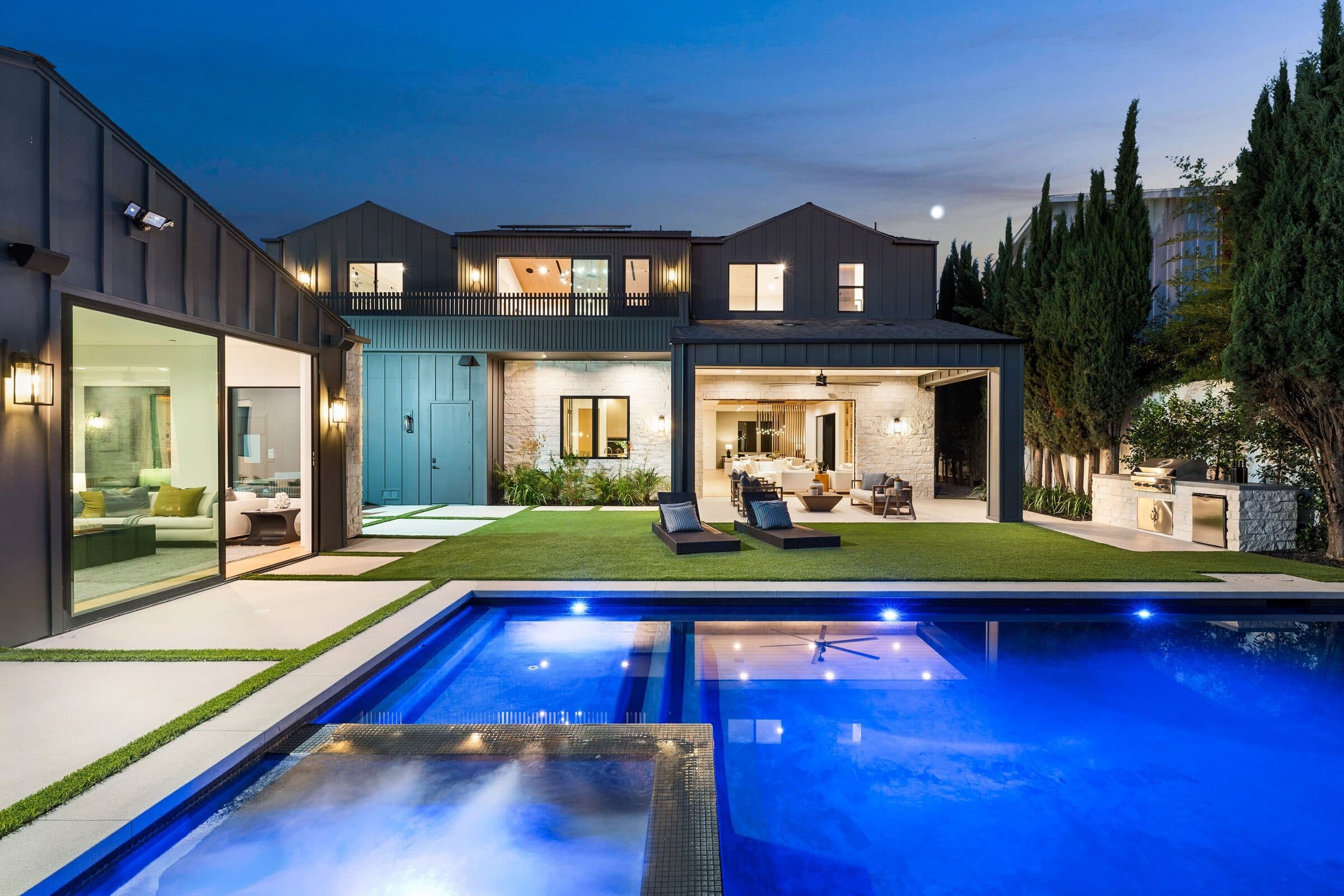 Pool LED lighting and automation upgrades. Modern farmhouse pool at dusk in Middle Tennessee